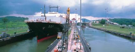 Ships in the Miraflores locks on the Panama Canal. (Reproduced by permission of Photo Researchers, Inc.)