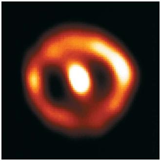 Ultraviolet image of Nova Cygni 1992. On February 19, 1992, this nova was formed by an explosion triggered by the transfer of gases to the white dwarf from its companion star. (Reproduced by permission of National Aeronautics and Space Administration.)